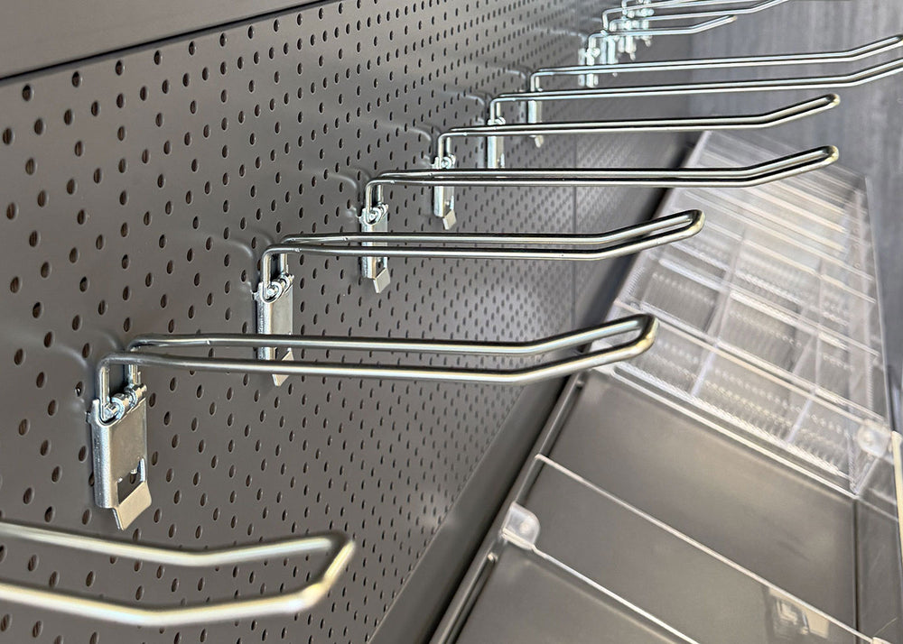 Perforated panels and peg hooks