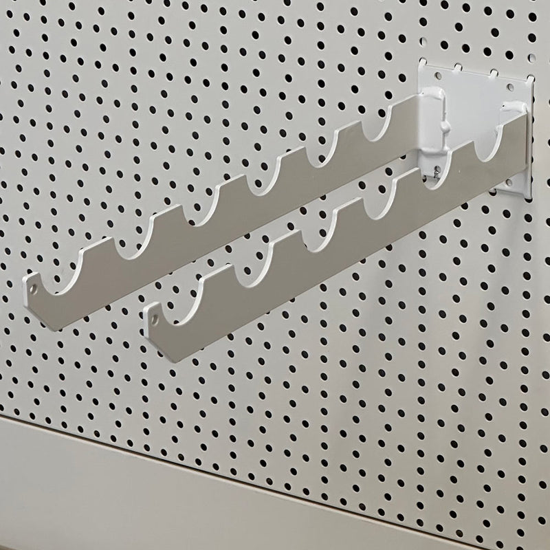 Spade or fork holder for perforated back panel